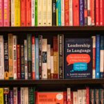 books on brown wooden shelf